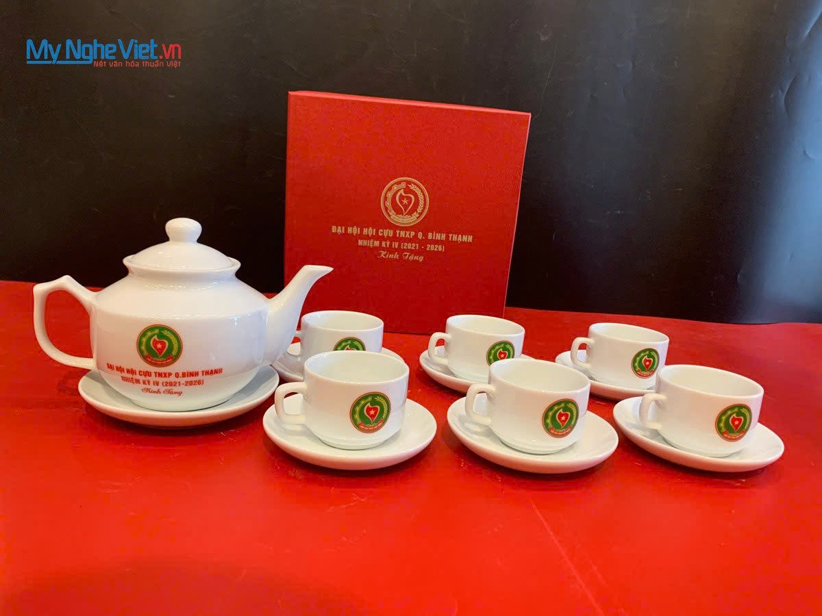 Bộ ấm chén - bình trà men trắng in logo đại hội